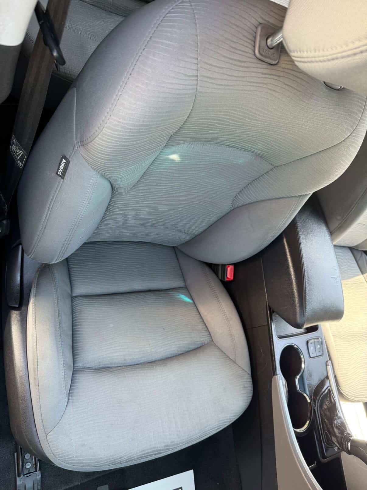 Refreshed front cloth seats after deep interior cleaning