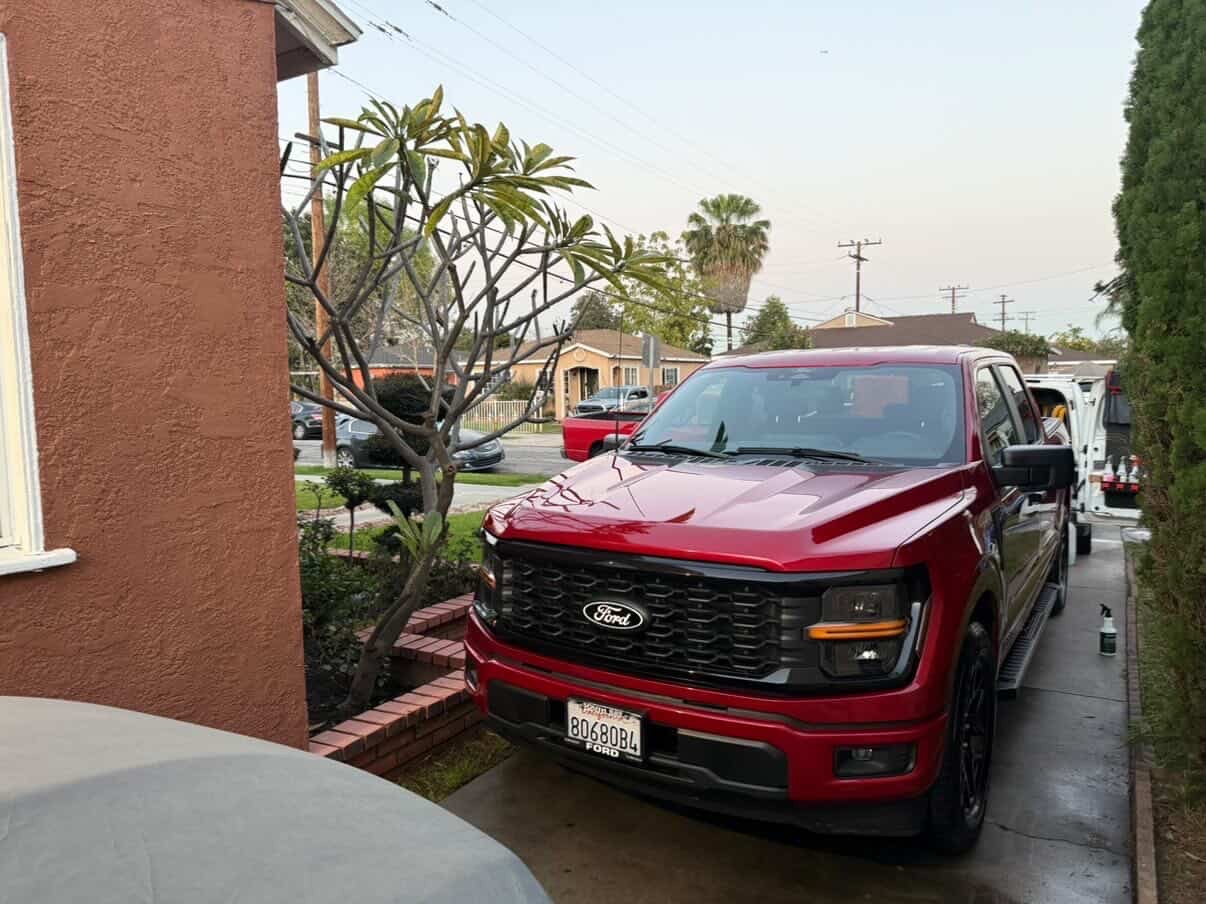 Red Ford F-150 truck front view detailed