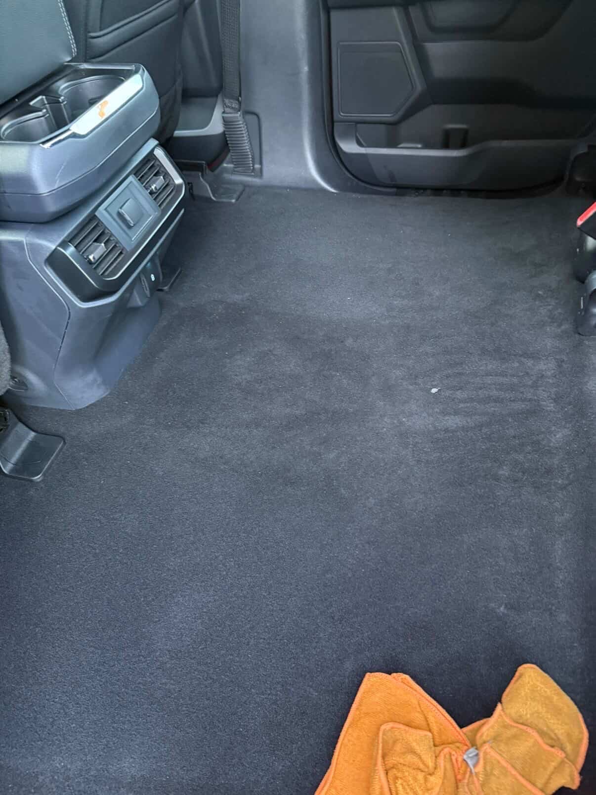 Truck rear floor carpet deep cleaned and vacuumed